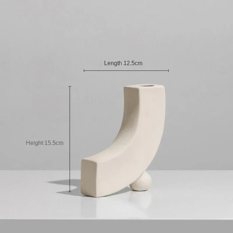 Set of modern abstract ceramic vases in matte beige, minimalist home decor for living room or dining table display