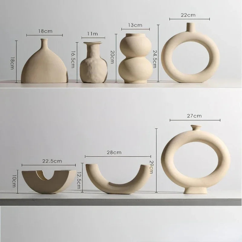 Set of modern abstract ceramic vases in matte beige, minimalist home decor for living room or dining table display