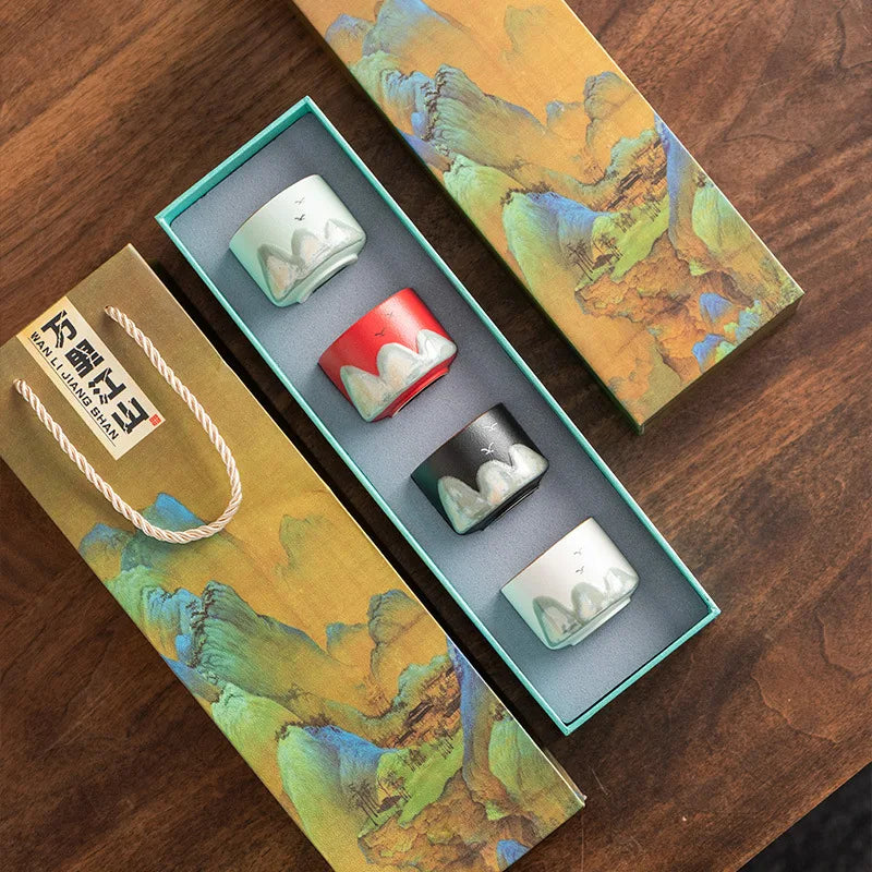 Set of four ceramic Chinese tea cups with hand-painted mountain design, gift box for traditional gongfu tea ceremony