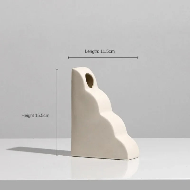 Set of modern abstract ceramic vases in matte beige, minimalist home decor for living room or dining table display