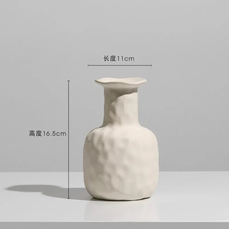 Set of modern abstract ceramic vases in matte beige, minimalist home decor for living room or dining table display