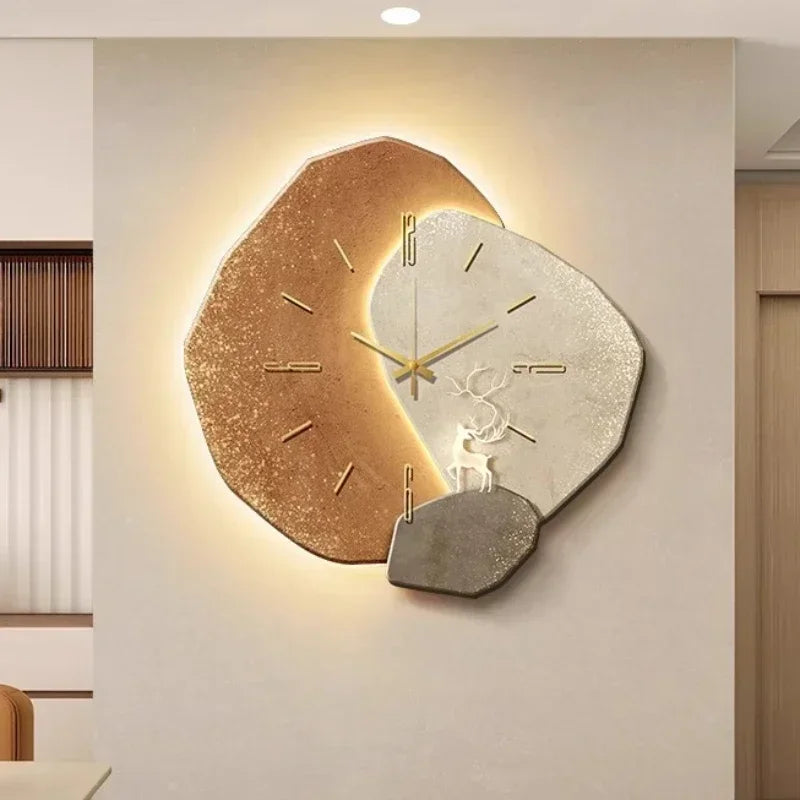 Modern LED wall clock with abstract stone design and golden deer, decorative timepiece for living room or office decor