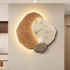 Modern LED wall clock with abstract stone design and golden deer, decorative timepiece for living room or office decor