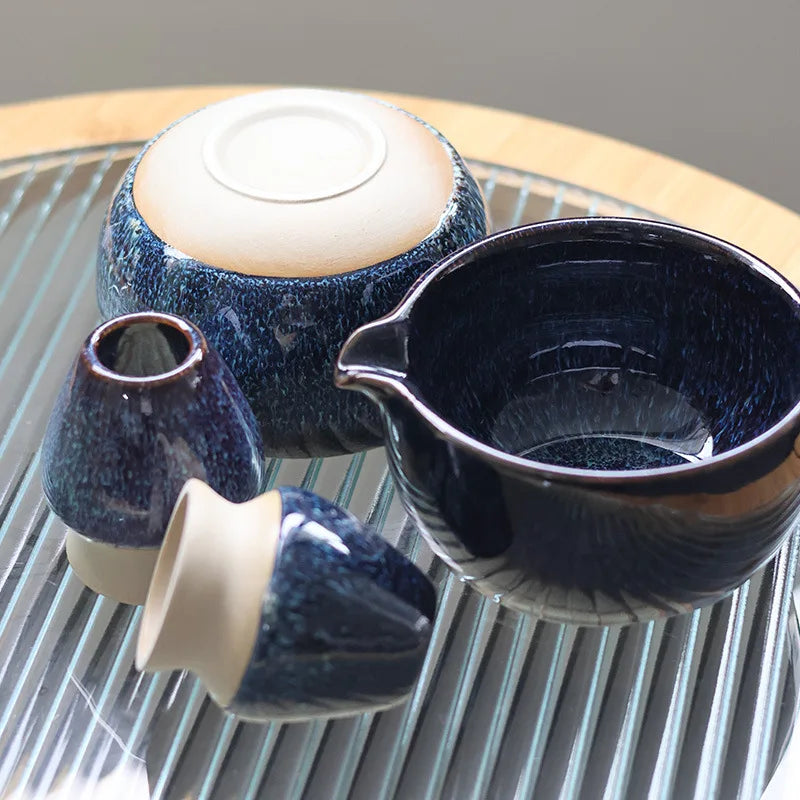Traditional Japanese matcha tea set with ceramic bowl, bamboo whisk, scoop, sifter, and whisk holder – complete matcha making kit