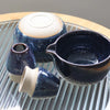Traditional Japanese matcha tea set with ceramic bowl, bamboo whisk, scoop, sifter, and whisk holder – complete matcha making kit