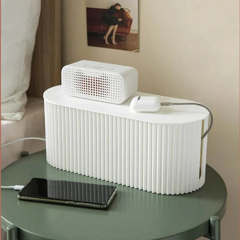 Modern cable management box with phone charging station, desktop cord organizer for home and office setup