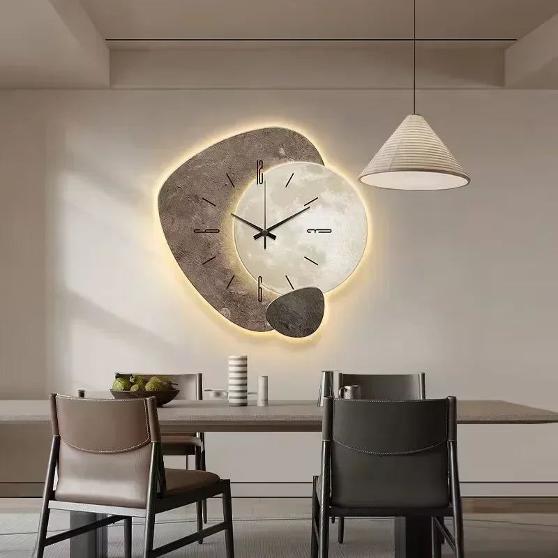 Modern LED wall clock with abstract stone design and golden deer, decorative timepiece for living room or office decor