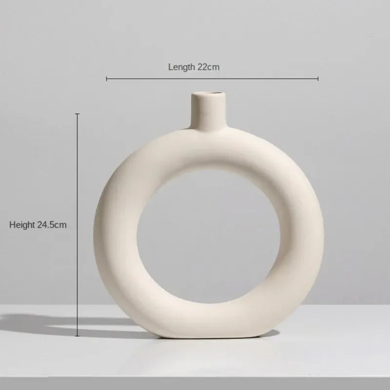 Set of modern abstract ceramic vases in matte beige, minimalist home decor for living room or dining table display