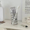 Stainless steel spiral makeup brush holder, modern cosmetic organizer stand for vanity or bathroom storage
