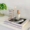 Stainless steel spiral makeup brush holder, modern cosmetic organizer stand for vanity or bathroom storage