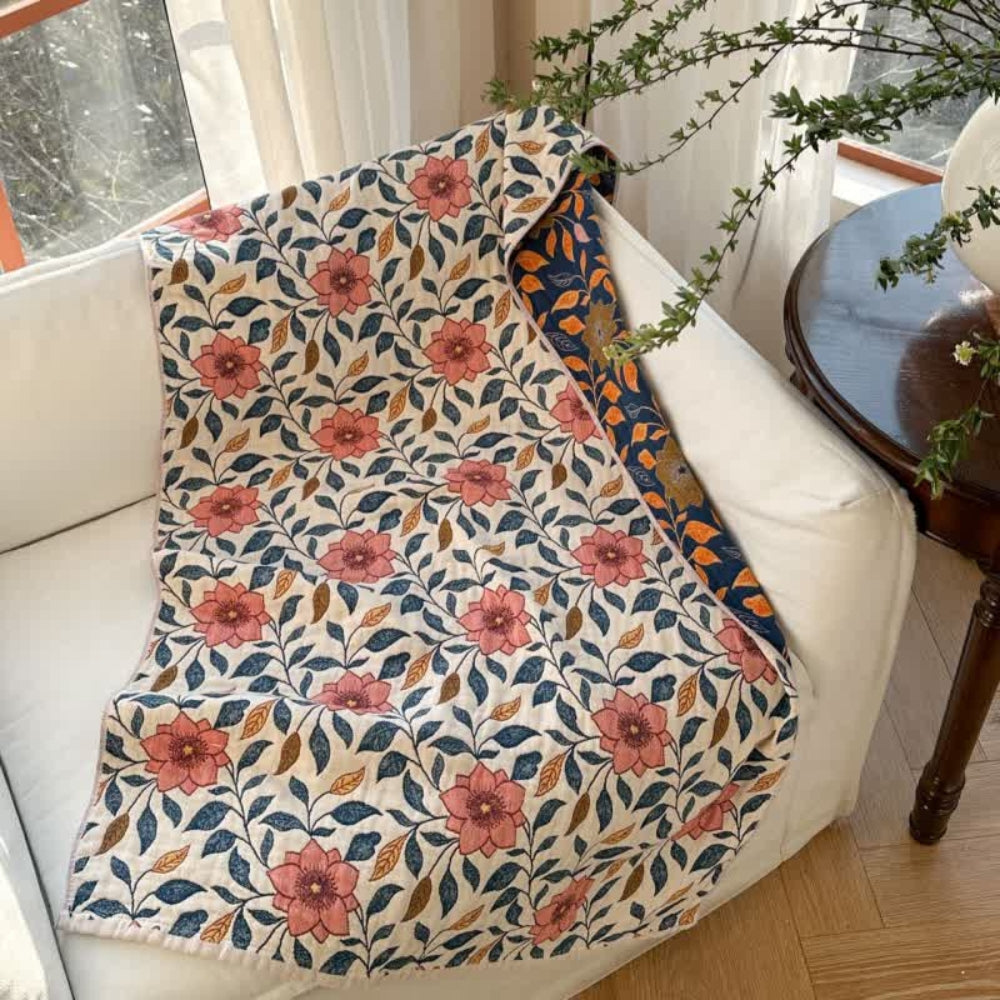 Soft throw blanket with pink floral and blue leaf pattern, cozy decorative blanket for living room, bedroom, or sofa décor