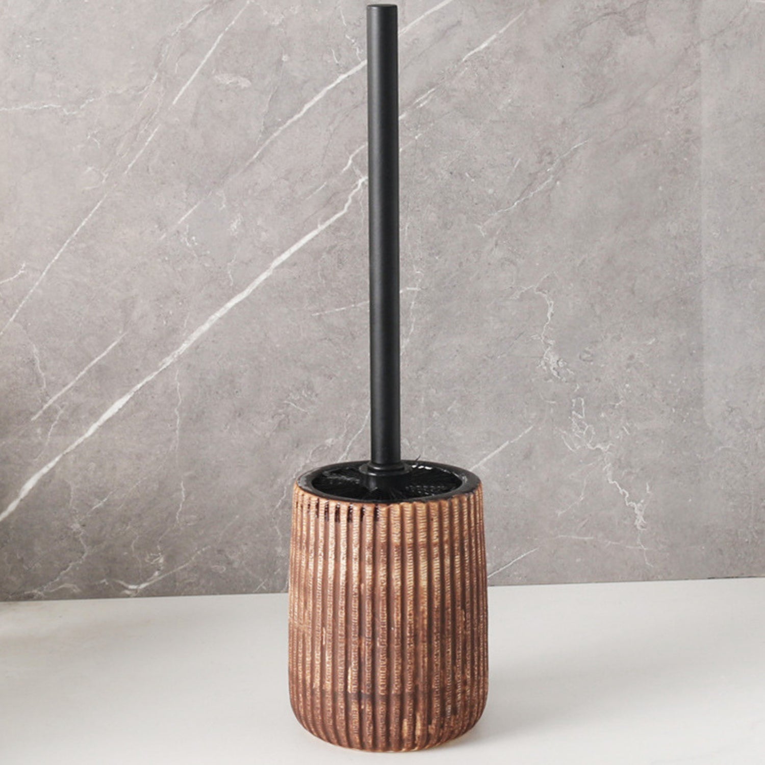 Textured ceramic toilet brush holder with black handle, modern bathroom cleaning brush set in rustic design