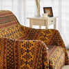 Throw blanket – Cotton-poly blend – Earthy tribal pattern – Reversible design – Cozy home accessory