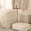Beige vacuum compression storage bags with handles for clothes, bedding, and seasonal organization – space-saving airtight storage solution for home