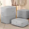 Beige vacuum compression storage bags with handles for clothes, bedding, and seasonal organization – space-saving airtight storage solution for home
