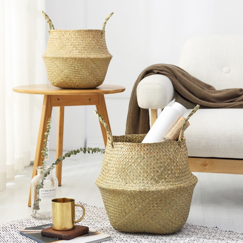 Handwoven seagrass storage baskets with pink and red roses, rustic woven planters for home decoration