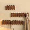 Wall-mounted wooden coat rack with foldable hooks, modern entryway organizer for jackets, bags, and keys