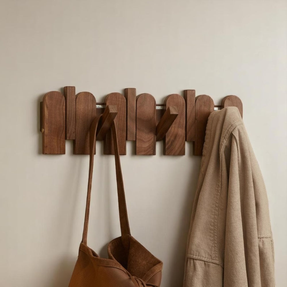 Wall-mounted wooden coat rack with foldable hooks, modern entryway organizer for jackets, bags, and keys