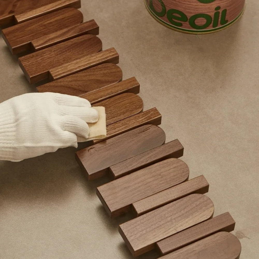 Wall-mounted wooden coat rack with foldable hooks, modern entryway organizer for jackets, bags, and keys