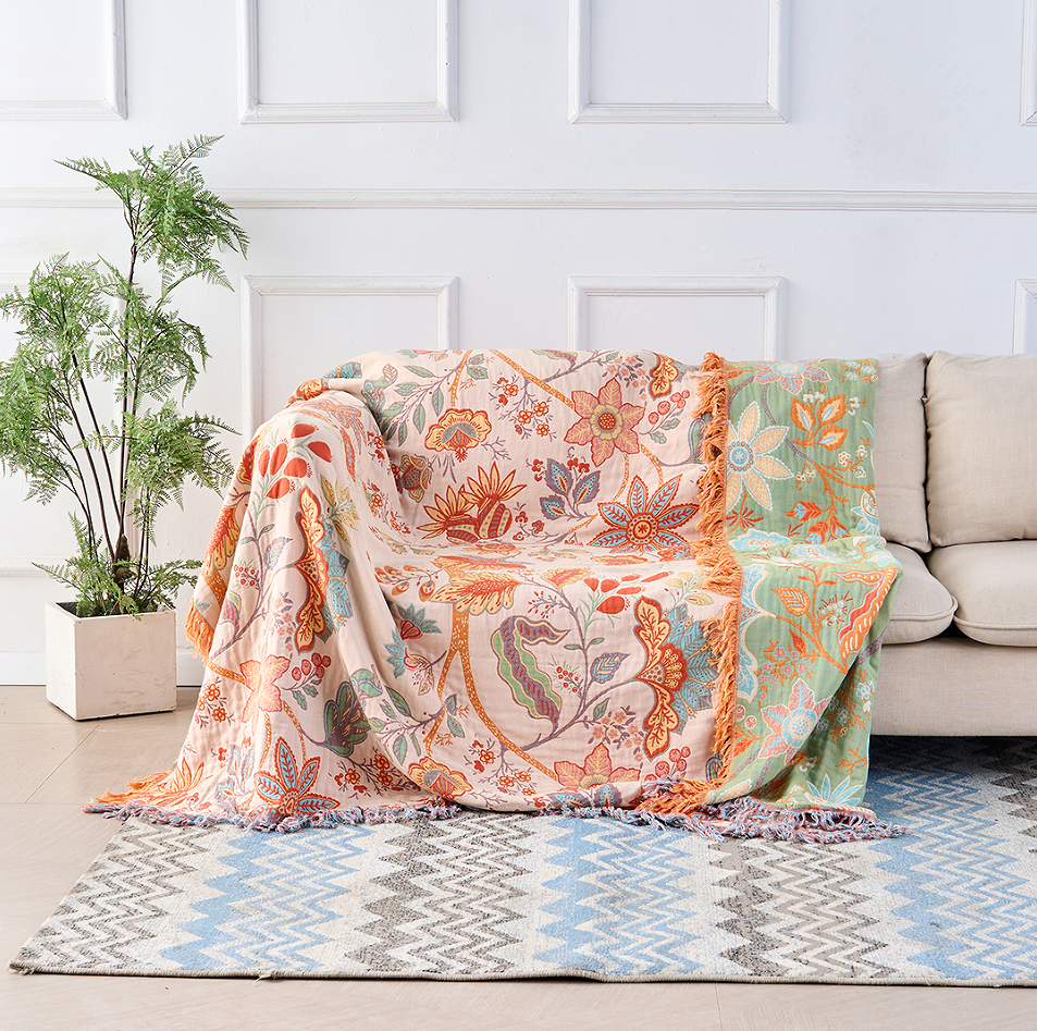 Bohemian floral sofa throw blanket with multicolor patterns and fringe edges, decorative couch cover for living room