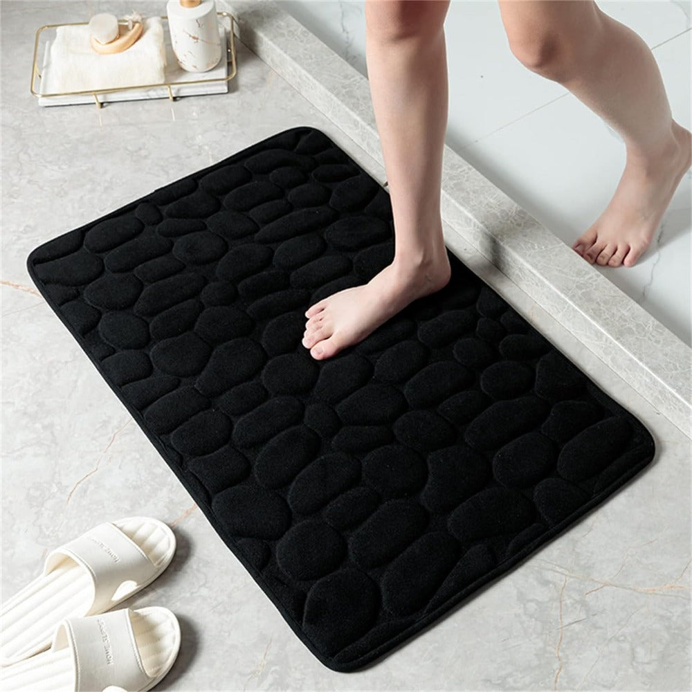 Soft absorbent bathroom floor mat with pebble design, non-slip microfiber bath rug for shower and tub area