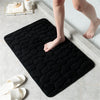 Soft absorbent bathroom floor mat with pebble design, non-slip microfiber bath rug for shower and tub area