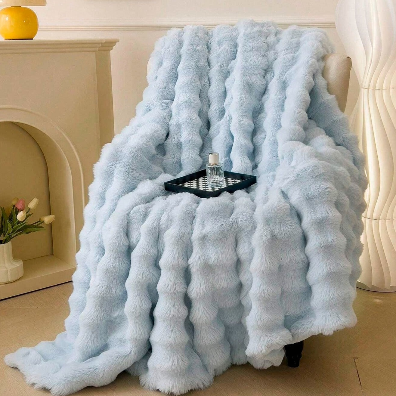 Light blue plush faux fur throw blanket with ribbed texture, ultra-soft and cozy bed or couch cover