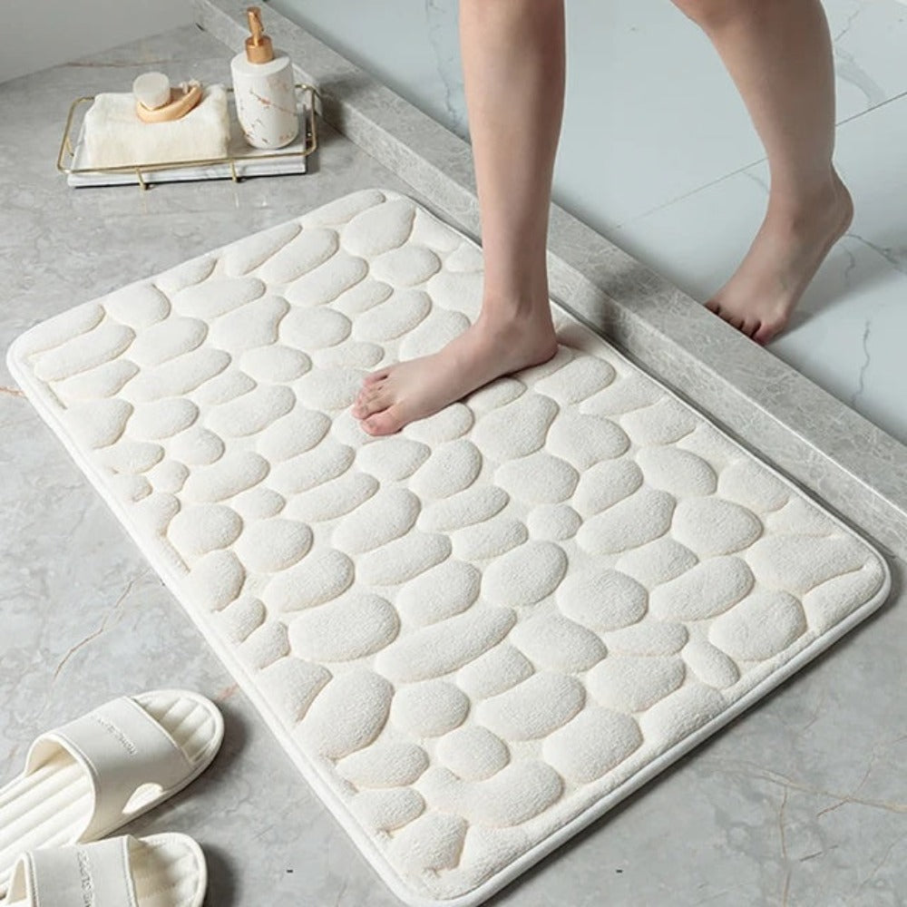 Soft absorbent bathroom floor mat with pebble design, non-slip microfiber bath rug for shower and tub area