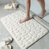 Soft absorbent bathroom floor mat with pebble design, non-slip microfiber bath rug for shower and tub area