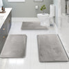 Set of three dark gray memory foam bathroom rugs with non-slip backing, soft absorbent bath mats for toilet, shower, and vanity area