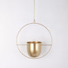 Set of modern hanging metal planters with geometric frames, indoor wall plant holders for home and balcony decor