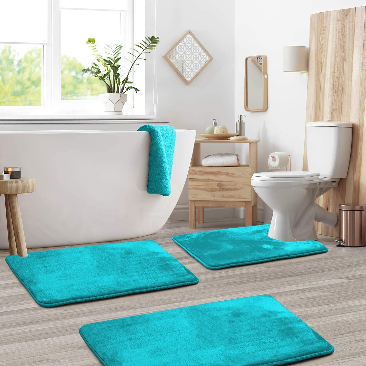 Set of three dark gray memory foam bathroom rugs with non-slip backing, soft absorbent bath mats for toilet, shower, and vanity area